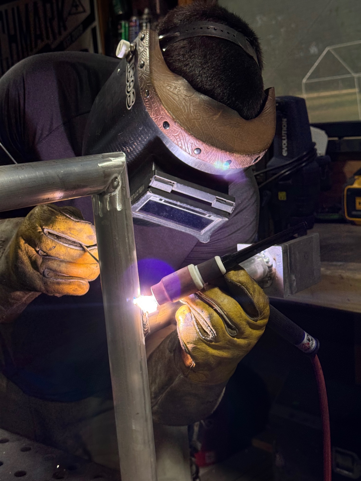 Sweets Fabrication TIG welding a steel frame in the shop